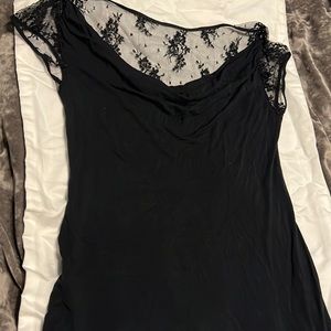 Super cute small black express shirt. Lacey too back and sleeve.
